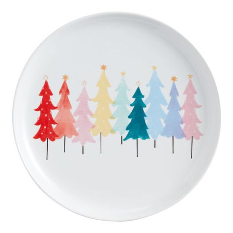 Bring a sense of wonderment and whimsy to your holiday dining table with our stoneware salad plate. Designed with pine trees in a rainbow of hues and gold star toppers on a white ground, it makes an oh-so-cheerful addition to your next Christmas feast. Xmas Plates, Nadolig Llawen, Pottery Place, Holiday Dining Table, Pottery Christmas, Painting Pottery, Christmas Rocks, Christmas Feast, Diy Pottery Painting