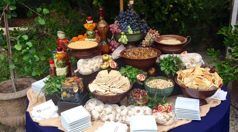 Mediterranean Mezze Station featured on PureJoyCatering.com Mediterranean Catering Display, Mediterranean Mezze, Carving Station, Wedding Caterer, Baba Ghanoush, Marinated Olives, Red Pepper Hummus, Catering Display, Food Wedding