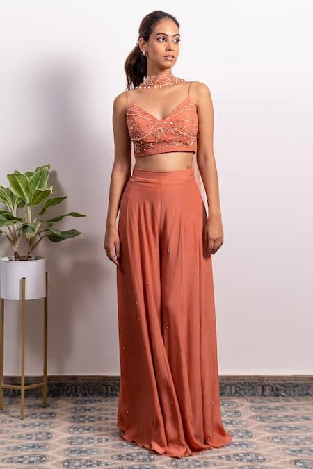 Buy Pink Crepe Embroidery Pearl V Neck Bustier And Palazzo Set For Women by Silky Bindra Online at Aza Fashions. Choker Dupatta, Indian Outfits Modern, Sewing Dresses For Women, Embroidered Bustier, Wedding Lehenga Designs, Traditional Indian Dress, Traditional Indian Outfits, Palazzo Set, Party Wear Indian Dresses