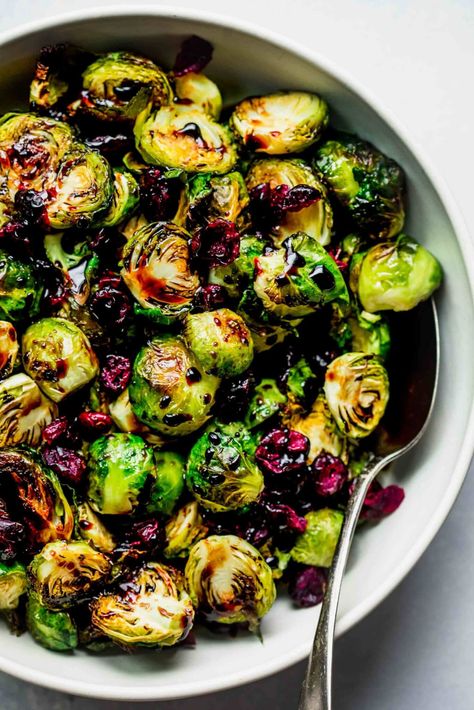 Roasted Balsamic Brussel Sprouts with cranberries is a simple side dish recipe that both kids and adults love! They're crispy and delicious. I get asked to make this dish every year for Thanksgiving and Christmas! // roasted oven // baked // oven // easy // vegan // best Brussel Sprouts With Cranberries, Thanksgiving Brussel Sprouts, Balsamic Glaze Brussel Sprouts, Brussel Sprout Side Dish, Cranberry Recipes Thanksgiving, Vegan Thanksgiving Side Dishes, Baked Brussel Sprouts, Balsamic Brussel Sprouts, Brussel Sprout Recipes Roasted