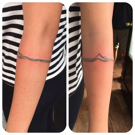 Mountain-band. #tattoo #machinefree #handpokedtattoo #stickandpoke #tattoonewzealand #tattoowanaka #holyskintattoo #armbandtattoo #mountaintattoo #lineartattoo Aqua Tattoo, Trend Tattoos, Tattoo Mountain, Tattoo Band, Armband Tattoos, Forearm Band Tattoos, Hand Poked Tattoo, Forearm Tattoo Women, Arm Band Tattoo