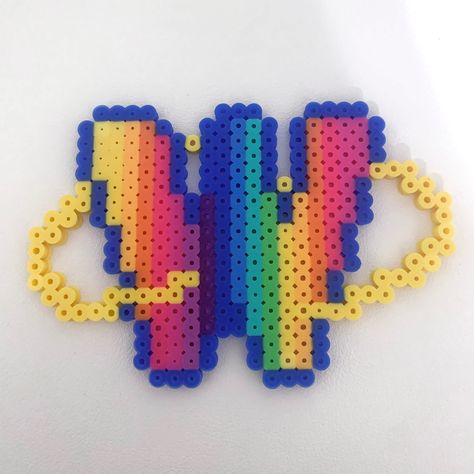 Kpop Perler Beads, Cartoon Perler Beads, Fuse Bead Patterns Rave, Rave Perler Ideas, Small Rave Perler, Perler Beads Rave, Pearler Bead Patterns Rave, Trippy Perler Bead Patterns, Rave Perler Pattern