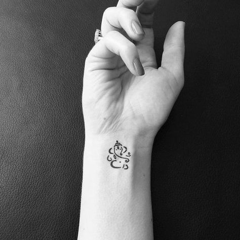 Small lord Ganesha tattoo Abstract Ganesha, Hindu Tattoos, Band Tattoos For Men, Trishul Tattoo Designs, Ganesh Tattoo, Om Tattoo Design, Hindu Tattoo, Ganesha Tattoo, Armband Tattoo Design