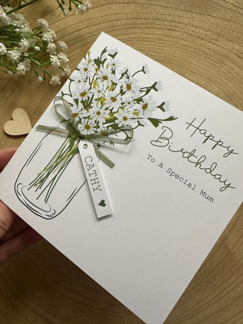 Personalised Birthday Card - Daisy Themed with Mini name tag A beautiful card featuring a vase of daises and a name tag, finished with the date if required. Our gifts are very easy to order all you need to do is select the option you require:- 1) Enter the name, relation and any sentiment such as special, beautiful, wonderful and a date if required. 2) We'll then make your order for and then package your card in environmentally friend packing 3) We send all of our cards with Royal Mail, 2nd clas 90th Birthday Cards Handmade, Birthday Cards For A Friend, Handmade Birthday Gifts For Best Friend, Mini Birthday Cards, Xmas Crafts Diy, Happy Birthday Clip, Calligraphy Cards, Happy Birthday Gift, Daisy Cards