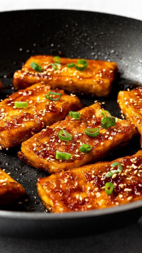 This teriyaki tofu is a delicious combination of pan-seared tofu slices and sweet and savory teriyaki sauce. Serve it alongside a bowl of fluffy white rice and your favorite vegetable sides for a quick and healthy dinner that will convert anyone into a tofu lover! Crispy Teriyaki Tofu And Avocado Rice Stack, Teriyaki Tofu Sandwich, Tofu Aesthetic, Tofu Side Dish, Vegetarian Tofu Recipes, Tofu Poke Bowl, Healing Meals, Tofu Rice Bowl, Seared Tofu