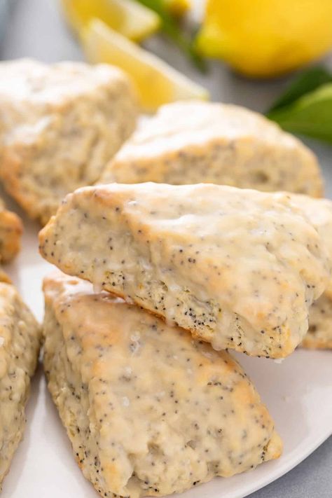 Lemon Poppy Seed Scones - My Baking Addiction Lemon Poppy Seed Scones Recipe, Lemon Poppy Scones, Lemon Poppyseed Scones Recipe, Lemon Raspberry Scones, Lemon Poppyseed Scones, Almond Poppyseed, Lemon Poppy Seed Scones, Lemon Poppy Seed Cookies, Poppy Seed Cookies