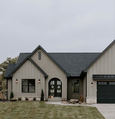 Aloof Gray Sherwin Williams Exterior, Modern Organic Exterior Design, Light Grey Painted Brick House Exterior, Dark Trim House Exterior, Quarry Gray Lp Siding, Beige Barndominium Exterior, Stucco With Board And Batten Exterior, Peppercorn House Exterior, Khaki House Exterior