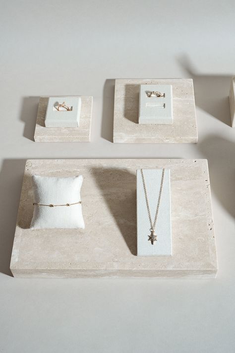 Linen display props and travertine blocks : a dream display duo #jewellerydisplay #displayprop #displayblock Fine Jewelry Display, Jewellery Displays, Charm Bar, Display Props, Versatile Jewelry, Shop Display, Retail Display, Understated Elegance, Jewelry Display