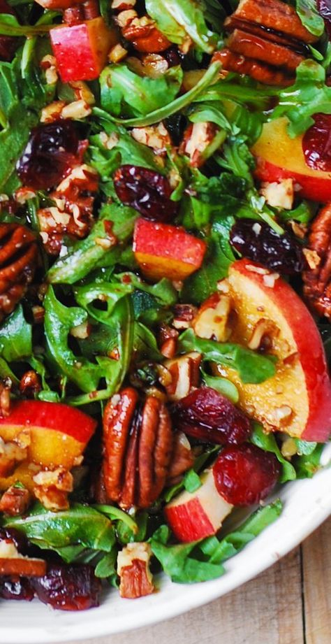 Arugula Salad with Apples, Cranberries, and Pecans in a white bowl. Lettuce Salad With Cranberries, Green Salad With Fruit Recipes, Healthy Pizza Side Dishes, Salad For Chicken Side, Salad With Nuts And Fruit, Salad With Nuts Recipes, Salads For Brunch Ideas, Fancy Side Salad, Salad To Pair With Steak