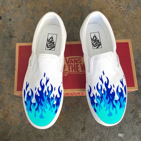 Navy blue, bright blue, neon blue flame fire tip Slip On Vans Shoes.﻿ We buy each pair of shoes BRAND NEW. Each pair is made to order, please make sure you put in the correct shoe size before you check out. The ink is permanent and will never come off, fade away, or peel off. Made in the USA. This price includes everything: shoes and artwork. Each pair of shoes is made-to-order and takes 2-3 weeks to ship usually. Because the artwork is custom-made for you, there are no exchanges or returns. Ple Flame Shoes, Custom Slip On Vans, Custom Vans Shoes, Painted Shoes Diy, Custom Sneakers Diy, White Slip On Shoes, Painted Vans, Slip On Vans, Custom Painted Shoes