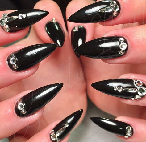 Stiletto Nails. Black Nails. Nails With Rhinestones. Acrylic Nails. Black Almond Nails With Rhinestones, Black Bedazzled Nails, Black Stiletto Nails With Rhinestones, All Black Nails With Rhinestones, Black Rhinestone Nail Designs, Rhinestone Acrylics, Black Nails With Gems Rhinestones, Black Nails Rhinestones, Black Nails With Diamonds Rhinestones