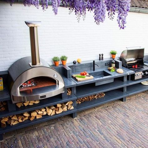 Backyard kitchens are a great way to entertain. Pizza is always a big hit with groups, especially when it is made in a pizza oven! Small Outdoor Kitchens, Outdoor Cooking Area, Modern Outdoor Kitchen, Outside Kitchen, Outdoor Kitchen Plans, Outdoor Bbq Kitchen, Outdoor Sinks, Outdoor Kitchen Design Layout, Outdoor Kitchen Island