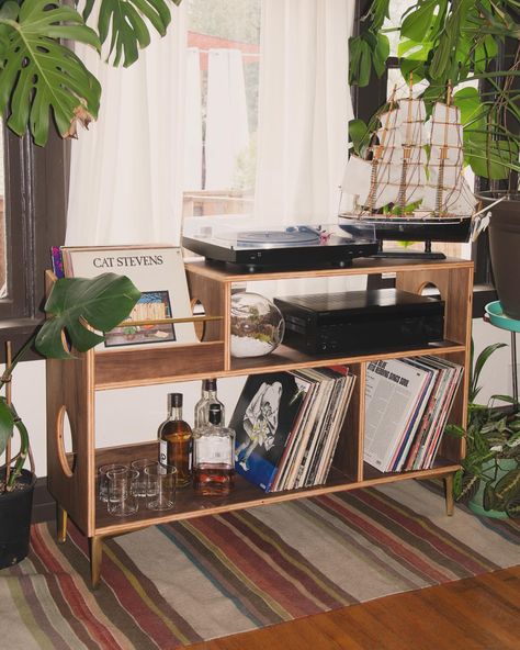 The “Headliner” in Walnut. We are relaunching Sidetracked Workshop making vinyl record consoles. Check out all 10 models on our website! #recordconsole #records #vinyl #mcm #midcenturymodern #furniture #walnut #whiteoak #boho #bohemian #vinylrecordstorage #recordstorage #music #lp #fyp #recordcollection #vinylcollection #homedecor #design #midcentury Vynils Furniture, Record Player Setup Aesthetic, Table Made Of Records, Record Station, Vinyl Living Room, Mid Century Vinyl Storage, Mid Century Modern Vinyl Record Storage, Vinyl Shelf Mid Century, Vinyl Setup