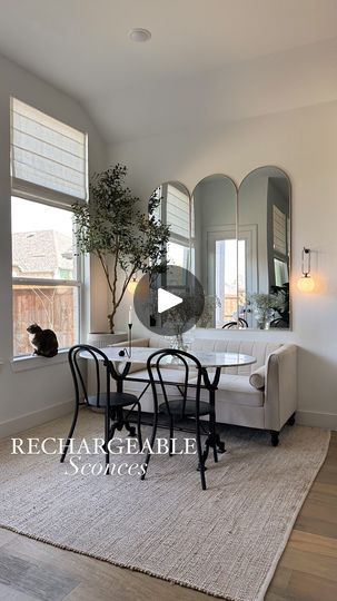 2.4M views · 104K reactions | Comment “SCONCE” and be sure to follow us to receive a dm with a link to these rechargeable sconces! 

No hardwiring? No problem!! These sconces are rechargeable and require no hardwiring. They were the perfect addition to this breakfast nook, adding the softest glow ✨ one note on these is that we only recommend using the bars they come with to hang the sconces from if you have studs where you’re hanging them. We needed to use drywall anchors, so we opted for these dainty $4 hooks instead and love them!! 🙌

#ltkhome  #interiorlighting #lightingideas #homehacks #homedecorlovers #amazonhome #amazonhomefinds #parisianinterior #amazonhomedecor sconce, home hack, home decor, renter friendly hack, interior lighting, lighting ideas, interior decor, home decor finds, Alexa Elizabeth, Bookcase Fireplace, Faux Walls, Parisian Interior, Drywall Anchors, Entryway Inspiration, Home Decor Finds, One Note, Lake Decor