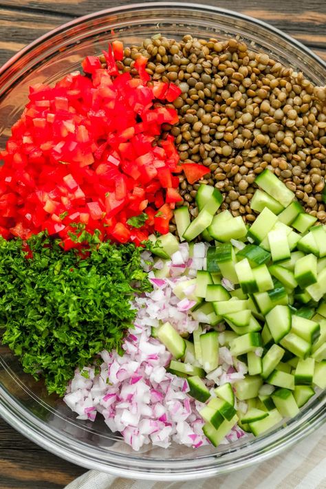 Easy to make Lentil Salad is loaded with a lot of ingredients that are not only good for your body, but for your tastebuds, too! A beautiful medley of fresh veggies and lentils is all tossed together with a simple lemon dressing. Lentil Salad With Olive, Recipe For Lentils Healthy, Lentil Vegetable Salad, Green Lentil Salad Recipes Cold, Lentil Mediterranean Salad, Whole Food Lentil Recipes, Lentil Salad Dressing, Lentils In Salad, Lentil Cold Salad