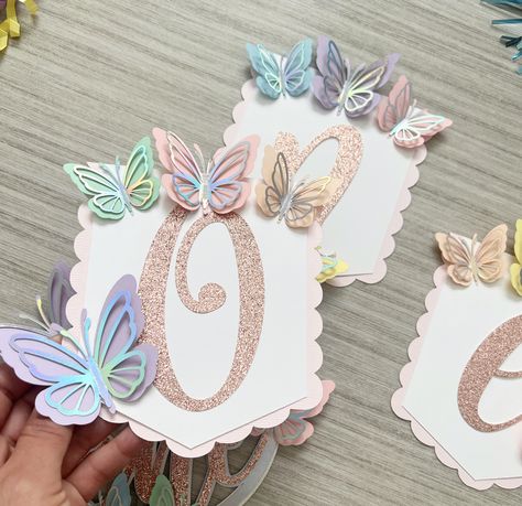 beautiful butterfly highchair banner and cake topper for your little one 1st birthday decor. These beautiful butterfly theme cake topper and highchair banner are perfect for your butterfly party theme. This cake topper is ready to be displayed on your cake. The measurements are 6.5” x 6.5” The highchair banner measures 16” x 6” Butterfly Birthday Theme Ideas, 1st Birthday Butterfly Theme, Butterfly Party Theme, Birthday Decorations Butterfly, Butterfly Birthday Party Ideas, Butterfly Theme Cake, Butterfly Birthday Decorations, Butterfly 1st Birthday, Butterfly Themed Birthday Party