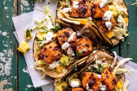 Sheet Pan Chipotle Salmon Tacos with Pineapple Jalapeño Salsa | halfbakedharvest.com Half Baked Harvest Salmon, Burrito Board, Chipotle Salmon Tacos, Chipotle Salmon, Salmon Tacos Recipe, Jalapeño Salsa, Tacos With Pineapple, Pescatarian Meals, Half Baked Harvest Recipes