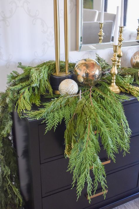 Decorating a Dining Room Sideboard for Christmas - Home with Holliday Christmas Dining Room Sideboard, Christmas Decor For Sideboard, Sideboard Christmas Decor Ideas, Winter Table Centerpieces For Home, Sideboard Christmas Decor, Christmas Sideboard Decor, Sideboard Decor Ideas, Christmas Sideboard, Decorating A Dining Room