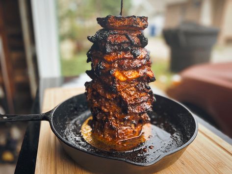 Tacos Al Pastor requires 15 minutes of prep time and 3 hours of cook time on your Char-Griller Griller. You'll need a vertical skewer, pork butt, pineapple, corn tortillas, white onion, cilantro, and Al Pastor marinade to complete this recipe! Vertical Skewer Recipes, Tacos Al Pastor Recipe Slow Cooker, Smoked Al Pastor, Smoker Al Pastor, Al Pastor Marinade, Pastor Marinade, Street Tacos Recipe Al Pastor, Smoked Tacos Al Pastor, Skewers Recipes