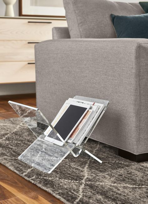 This modern magazine rack has a sculptural shape and provides storage for your magazines, books or papers. The design is constructed of a sleek acrylic material that adds a fresh elegance to your space. Modern Storage Furniture, Modern Magazine, Modern Organization, Magazine Stand, Magazine Storage, Bath Inspiration, Sleek Storage, Acrylic Design, Rug Inspiration