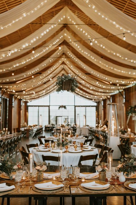 Rustic Ceiling Ideas Wedding, Transform Wedding Venue Spaces, Wedding Venue Indoor Decorations, Indoor Hall Wedding Decor, Wedding Venue Ideas Indoor Receptions, Wedding Indoor Venue Ideas, Wedding Light Fixtures, Quonset Wedding Receptions, Western Indoor Wedding