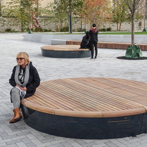 The Solid Podium Discs are circular platforms that serve as playful seating elements. The Discs feature a Solid slatted structure in multi-coloured hardwood with a red-brown colour.       #Design #Outdoor #Streetfurniture #Podium #Solid #Hardwood #Round #Platforms Public Garden Architecture, Park Seating, Diy Furniture Cheap, Public Space Design, Public Seating, Diy Furniture Hacks, Urban Park, Urban Furniture, Garden Architecture