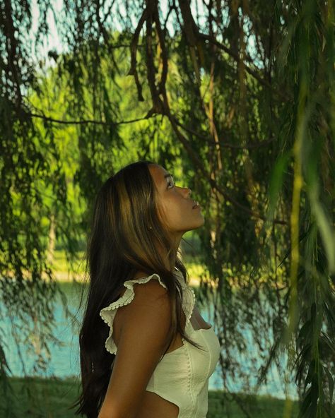 A senior shoot under the willow with the beautiful @wai.khaii 🌳🪷🌊🌅 • • • • Keywords: visual poetry, summer, pinterest, Indiana, couple photos, documentary style photography, Indiana photographer, vintage, storytelling photography, cinematic style photography, golden hour, summer photoshoot, Summer inspo, wildflowers, spring, senior photos, art, golden hour photos, pinterest inspo, Sunsets, vsco, couple photography, senior, senior pictures, class of 2025, 2025 senior, documentary, storytelling... Senior Photos Wildflowers, Senior Picture In Field, Senior Pics Unique, Dreamy Graduation Pictures, Summer Senior Photos, Art Senior Pictures, Senior Photos Nature, Senior Picture Aesthetic, Non Traditional Senior Pictures