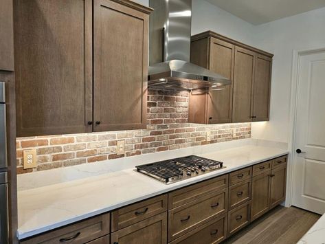 Modern Faux Brick Backsplash Ideas - Pair Exposed Brick Backsplash with closed Shelving White Wash Brick Kitchen, Brick Behind Stove In Kitchen, Brick Wall Interior Kitchen, Exposed Brick Backsplash, Faux Backsplash, Brick Backsplash Ideas, Closed Shelving, Faux Brick Backsplash, Herringbone Brick