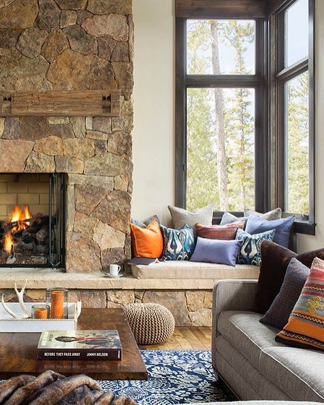 Modern.Rustic.Dreams on Instagram: “Where better to put a window seat than next to a gorgeous stone fireplace? Each stone was strategically placed! 😲” Corner Stone Fireplace, Cabin Fireplace, Rustic Lake Houses, Fireplace Seating, Window Benches, Living Room Corner, Rustic Bathroom Decor, Transitional Living Rooms, Modern Fireplace