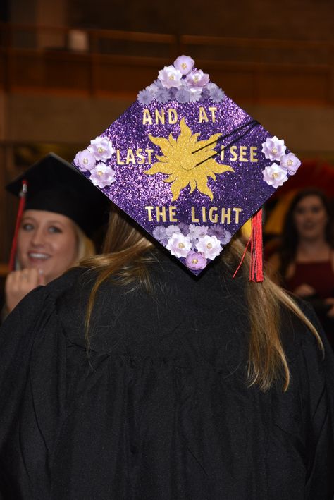 Repunzle Graduation Cap, Marine Science Graduation Cap, Purple Graduation Cap Designs, Graduation Cap Designs Rapunzel, Olivia Rodrigo Grad Cap, Grad Cap Ideas Tangled, Graduation Cap Designs Twilight, Tinker Bell Graduation Cap, Scream Graduation Cap