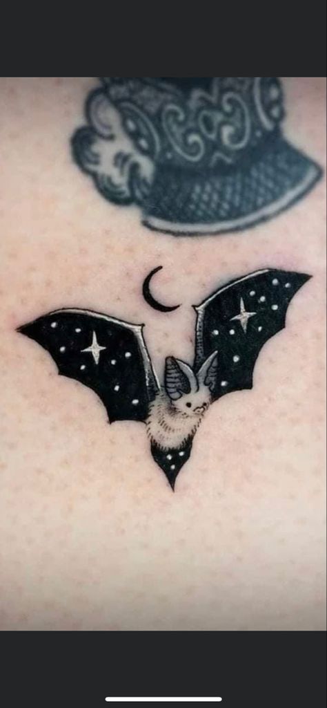 Cute star bat tat Galaxy Bat Tattoo, Spooky Wrist Tattoos For Women, Bat Tattoos Cute, Star Wings Tattoo, Bat Halloween Tattoo, Cute Bat Tattoo Ideas Small, Bat And Stars Tattoo, Mini Bat Tattoo Ideas, Glitter Bat Tattoo