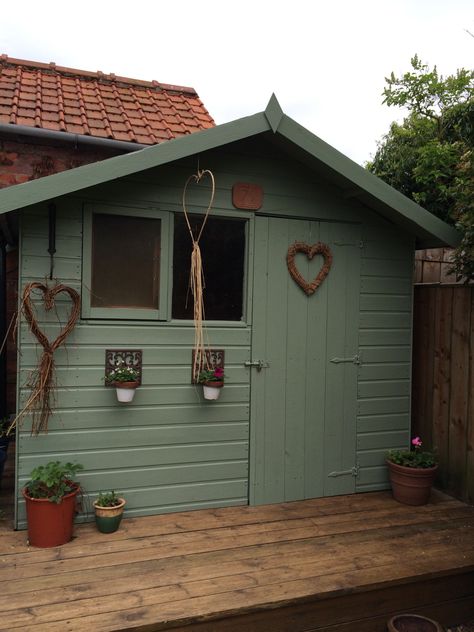 Painted the shed green Colourful Shed, Shed Colors Ideas Paint Exterior, Green Shed Colors, Shed Decoration Exterior, Paint Garden Shed, Shed Upgrade, Green Garden Shed, Yellow Shed, Garden Shed Colours Ideas