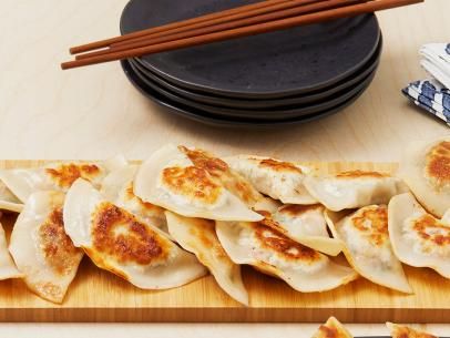 Pork-and-Shrimp Chive Dumplings Recipe | Food Network Chive Dumpling Recipe, East Asian Food, Dumplings Recipe Chinese, Pork And Chive Dumplings, Chive Dumplings, Asian Dumplings, Pork Shoulder Recipes, Steamed Shrimp, Pork Soup