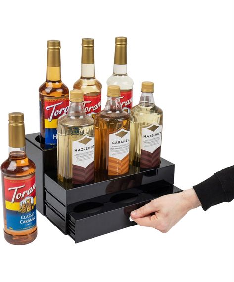 Holds up to 9 syrups. Helps organize flavors and gives them a secure and stabke place to sit. #syrupholder #lemonade #lemonadebusiness #syruporganizer Tiered Organizer, Coffee Syrups, Coffee Bar Accessories, Foundation Collection, Coffee Stations, Syrup Bottle, Countertop Organizer, Caramel Syrup, Food Storage Container Set