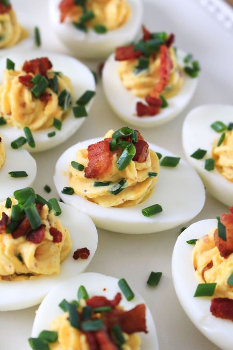 Loaded Deviled Eggs are fully loaded with cheddar cheese, bacon, chives, and horseradish mustard. You will want to serve them at every holiday and party! Jalapeño Deviled Eggs, Loaded Deviled Eggs, Deviled Eggs Recipe Best, Spicy Deviled Eggs Recipe, Horseradish Mustard, Jalapeno Deviled Eggs, Bakery Style Blueberry Muffins, Spicy Deviled Eggs, Classic Deviled Eggs