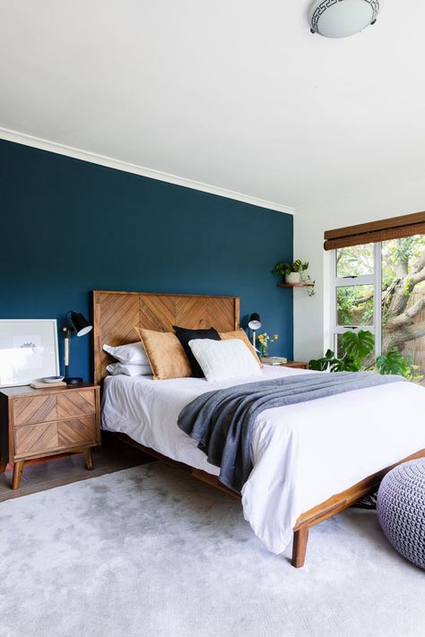 Blue Bedroom Wood Bed, Navy And Earth Tone Bedroom, Dark Wood Blue Bedroom, Navy And Wood Bedroom Ideas, Blue Bedroom Wood Furniture, Bedroom Blue Wall Decor, Deep Blue Accent Wall Master Bedrooms, Indigo Accent Wall Bedroom, Blue Color For Bedroom Walls