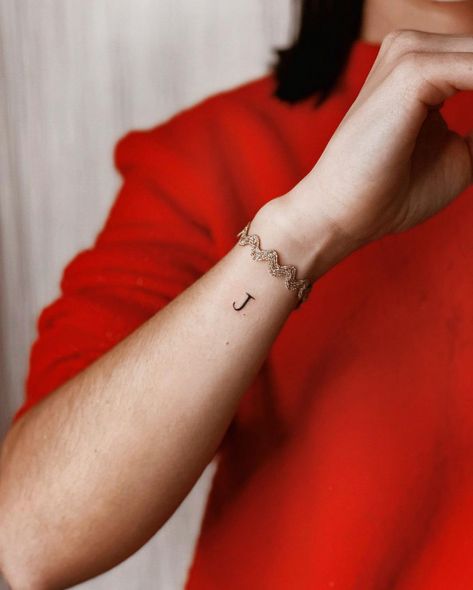 Tiny Letter Tattoo Wrist, J Tattoo Letter Ideas Women, Heart J Tattoo, Small J Tattoo Letter, The Letter J Tattoo, J Tatoos Initial, Wrist Letter Tattoo, Small Tattoo Ideas On Wrist, Wrist Tattoos With Names