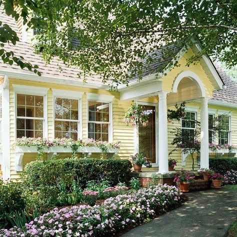 I am a sucker for yellow houses. Even better if they have black shutters. Pergola Hammock, Yellow House Exterior, Tudor Cottage, Yellow Cottage, Pergola Ideas, Yellow House, Hammock Stand, Exterior Paint Colors For House, Yellow Houses