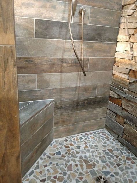 Are you planning a new bathroom or remodeling your current one? Has it always been your dream to have a glamorous walk-in shower? There's a lot to be ... | 10-Use-Uneven-Stones-for-an-Accent-Wall #bathrooms #walkinshower #shower #bathroom #decoratedlife #bath #bathroomdecor Rustic Bathroom Shower, Makeover Kamar Mandi, Tile Walk In Shower, Tile Remodel, Corner Bench, Master Shower, Shower Organization, Bathroom Shower Tile, Bathroom Remodel Shower