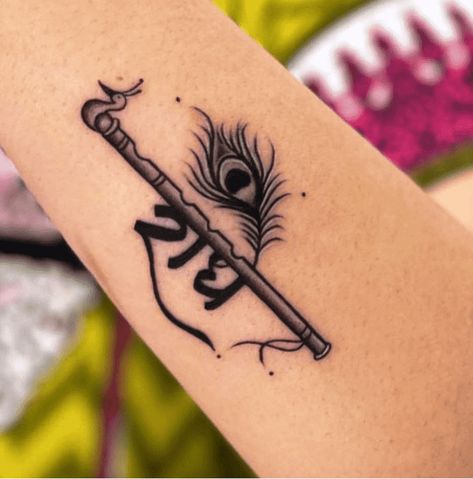 Krishna Tattoo Design Ideas Images Basuri Krishna Flute Mehendi, Flute And Feather Tattoo, Krishna Ji Tattoo, Radha Tattoo Design, Basuri Krishna Flute Tattoo, Flute With Feather Tattoo Designs, Basuri Krishna Flute, Krishna Tatoos Small, Krishna Tattoo Design For Men