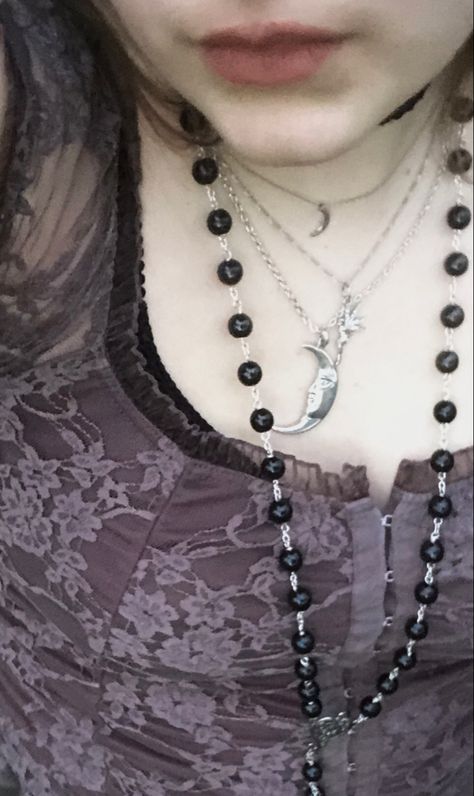 A mid-size person/girl wearing a tight purple lace top and olive green cargo pants. The person is also wearing multiple silver necklaces, one in form of a fairy, another in form of a moon. They are also wearing black platform dr. Marten shoes and multiple crystal rings. Grunge Rosary Necklace, Dark Fairycore Jewelry, Rosary Necklace Aesthetic, Purple Fairy Grunge, Purple Grunge Outfits, Fairy Grunge Necklace, Fit Aesthetic Outfit, Fairy Grunge Jewelry, Grunge Outfits Black