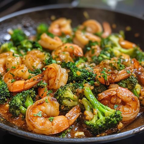 Shrimp and Broccoli Stir Fry in Garlic Sauce 🍤🥦 Ingredients: For the Stir Fry: 1 lb large shrimp, peeled and deveined 2 cups broccoli florets 2 tbsp vegetable oil 1 red bell pepper, thinly sliced (optional) 1 tbsp sesame seeds (for garnish) For the Garlic Sauce: 4 cloves garlic, minced 1/4 cup soy sauce 2 tbsp oyster sauce 1 tbsp honey or brown sugar 1 tbsp cornstarch 1/4 cup water 1 tsp sesame oil 1/2 tsp red pepper flakes (optional, for heat) Instructions: Prepare the Sauce: In a small bowl... Cooking Mama, Shrimp And Broccoli, Cheap Food, Broccoli Stir Fry, Food Rules, Large Shrimp, Nutritious Diet, Broccoli Florets, Oyster Sauce