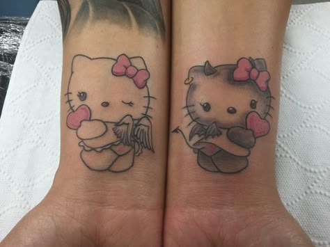 Back Tattoo Women Spine, Hello Kitty Tattoo, Kitty Tattoos, Small Matching Tattoos, Kitty Tattoo, Hello Kitty Black, Hello Kitty Tattoos, Black And Grey Tattoo, Tattoo Wrist