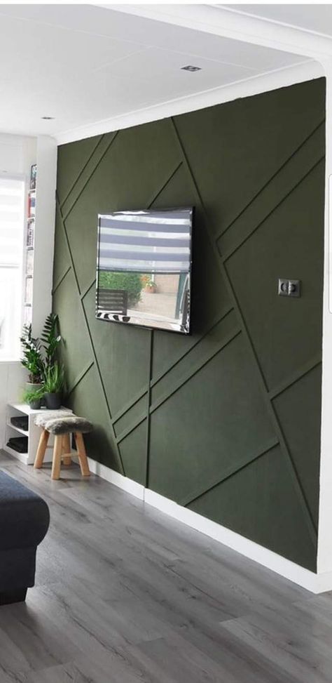 Hunter Green Basement Wall, Evergreen Accent Wall, Wood Panel Accent Wall Living Room, Olive Accent Wall, Green Accent Wall Office, Dark Green Accent Wall Living Room, Fluted Panel Tv Wall, Green Accent Wall Living Room, Green Accent Wall