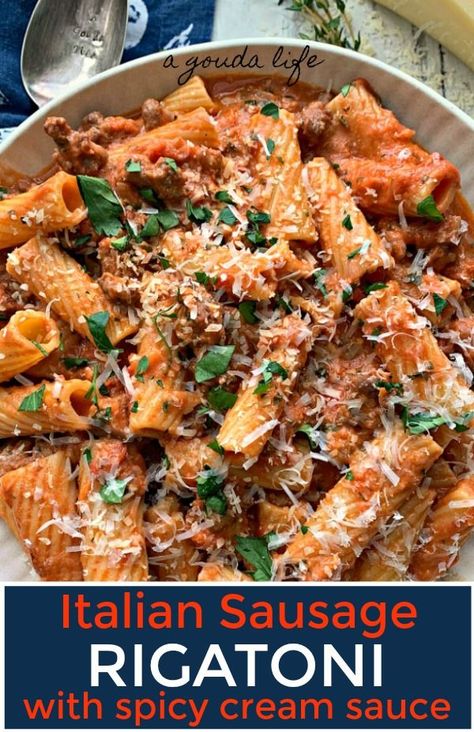 Sausage Rigatoni + spicy tomato cream sauce. Bonus: the pasta tubes fill up with the amazing sauce. Translation: every bite is a winner. Quick and easy (30 minutes) enough for weeknight dinner. Gourmet enough for entertaining. #valentinesday #pasta #sausagerigatoni #italiansausage #italiansausagerigatoni #agoudalife Sausage Rigatoni Recipes, Spicy Tomato Cream Sauce, Italian Sausage Rigatoni, Rigatoni Pasta Recipes, Spicy Shrimp Pasta, Sausage Rigatoni, Kitchen Sanctuary, Cheesy Chicken Pasta, Rigatoni Recipes