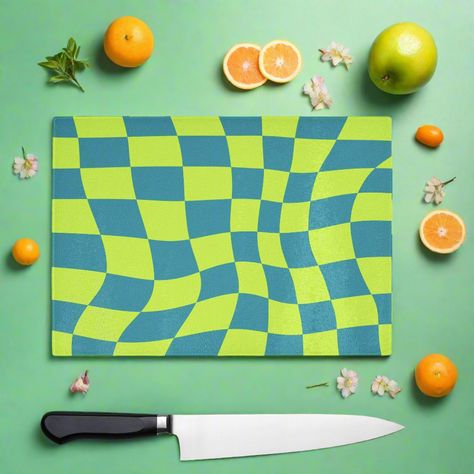 90s style Green colourful check wavy chopping board, the vibrant throwback design will bring a smile to your face while the durable glass surface offers food safe protection for your worktops. This fun piece can protect your surface and can also be used on the table to protect against hot items, its even suitable to serve food on. If you love the 90s and colour this is the board for you. You can shop the matching coasters. High quality, tempered (shatterproof) glass that's hygienic and easy to clean Incredibly durable making it easy to use ever day. Doubles as a serving platter, perfect for gatherings and parties. Made to order in the U.K with high quality materials. Technical Material: Smooth, toughened glass Easy to clean - Dishwasher safe 4 non-slip PVC feet, Hand-printed to order Size: Love The 90s, Coaster Art, Pretty Mugs, Glass Chopping Board, Clean Dishwasher, 90s Style, Serving Food, Chopping Board, Small Decor