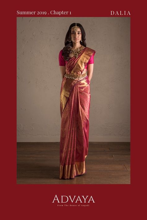 #Advaya    DALIA by Advaya  The Brocade Gandaperunda Kanjivaram Silk Sari    Engraved in silk and gold   of the legends of yesterday   are the lores of a mythical bird of paradise,   unseen to mortal eyes,   soaring over the cover of the ethereal sunset clouds.    This brocaded saree in pure zari has the two-headed mythical bird, a symbol of prosperity, the ‘Gandaperunda’ woven in the silken body of the saree. Soft to drape and magnificent to look at, this self tone saree in deep pink, gilded in Kanjivaram Wedding Sari, Kanjivaram Saree Styling, Simple Bride Saree, Kanjivaram Sarees Silk For Bride, Brides In Kanjivaram Saree, Wedding Kanjivaram Saree, South Indian Pink Saree Look, Rose Gold Wedding Saree, Silk Saree Reception Look