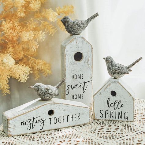 PRICES MAY VARY. Spring Farmhouse Style: These three wooden birdhouse-shaped table decors are designed to infuse a touch of spring farmhouse style into your home, bringing a fresh and welcoming vibe. Distressed Whitewashed Finish: Each piece features a distressed whitewashed finish, imparting a rustic charm that enhances the overall aesthetic, creating a vintage and weathered appearance. Lively Hummingbird Detail: Adding a lively element to the decors, each piece includes a small hummingbird fig