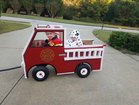 Wagon To Firetruck, Turning A Wagon Into A Fire Truck, Trunk Or Treat Firetruck, Trunk Or Treat Ideas Firetruck, Wagon Fire Truck Diy, Fire Truck Stroller Costume, Fire Truck Wagon Halloween, Fire Truck Halloween Costume, Firetruck Wagon Halloween