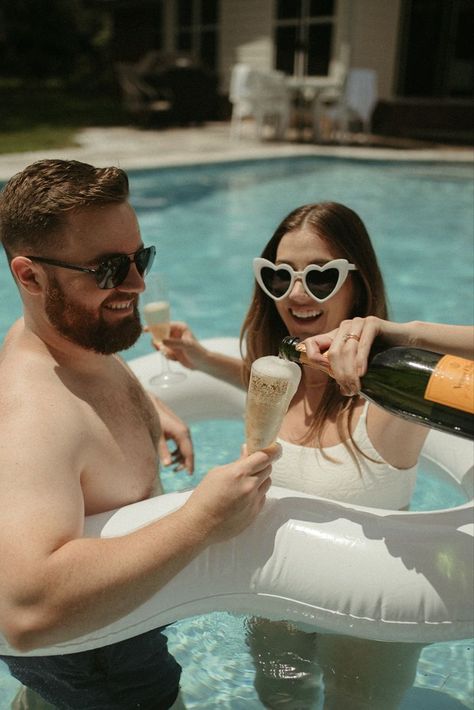 Do you think this engagement session is unique?Make a splash with your engagement photos! This poolside shoot features a white bikini, champagne, and cute heart blow-up floats. Get ready to create memories that will last a lifetime. Marty got her white bikni from Billabong. It's perfect for bachelorette trips or your honeymoon. Do you want to see more from Their playful pool engagement session? #engagementphotos #whitebikini #popthechampagne Cool Engagement Photos, Fun Engagement Photos, Strawberry Slice, When I Get Married, Fun Photoshoot, Summer Photoshoot, Bachelorette Trip, Summer Pool, Jacksonville Florida